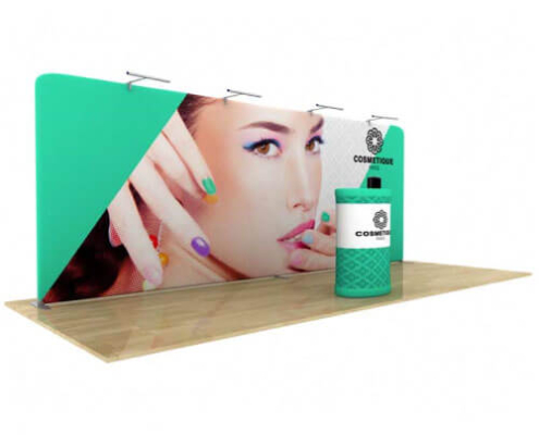 AirWall 20ft x 8ft straight tension fabric trade show display, fully assembled with LED lights, sample trade show graphic, and optional podium with graphic in a white studio setting